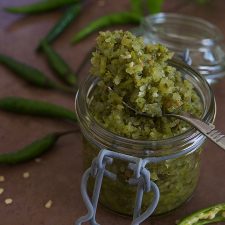 Sambal Ijo, green chilli sauce in glass jar, dark photo