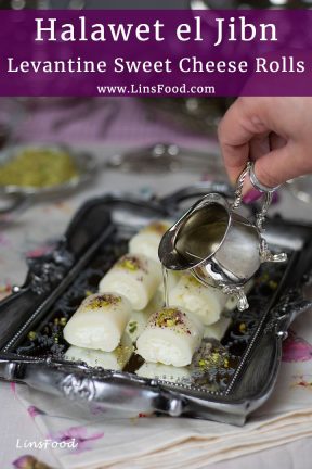 pouring sugar syrup on Halawet el jibn on a glass tray