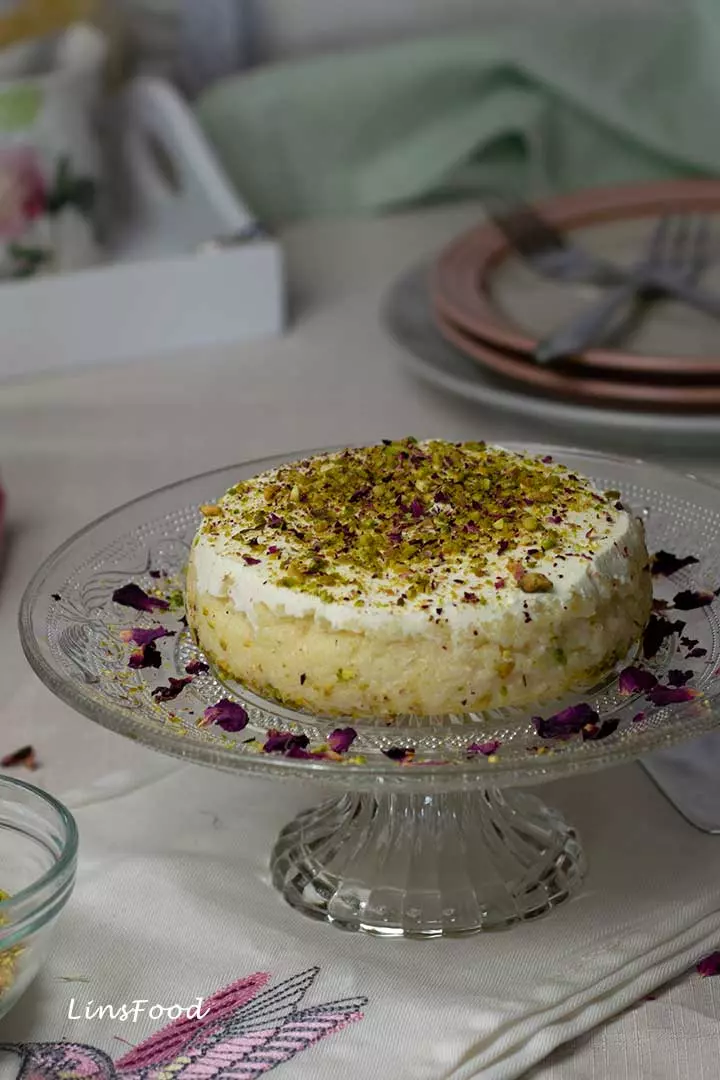 Layali Lubnan, small round with pistachios and rose petals on small cake satnd
