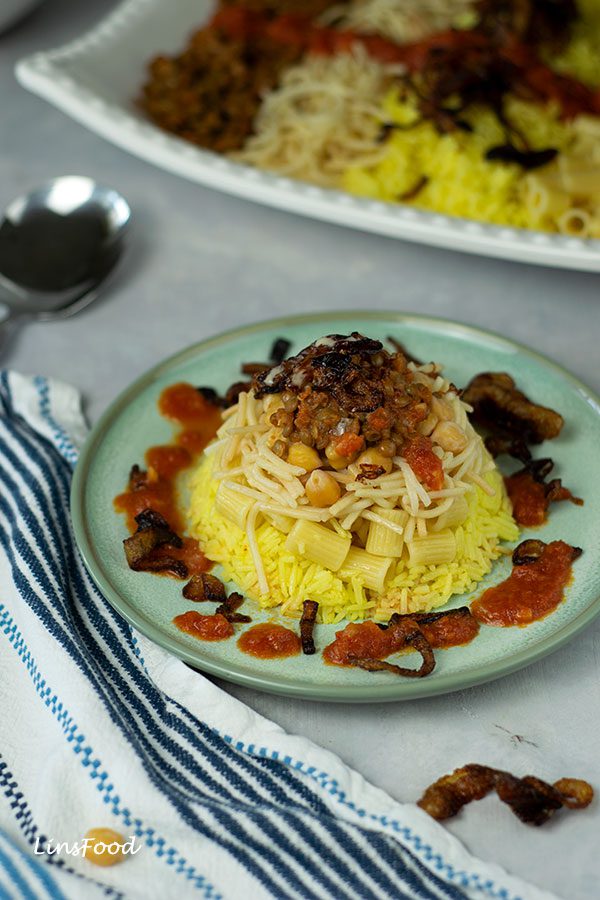 tarabeesh, dome shaped Egyptian koshari, layers of rice, pasta, noodles, chickpeas and lentils