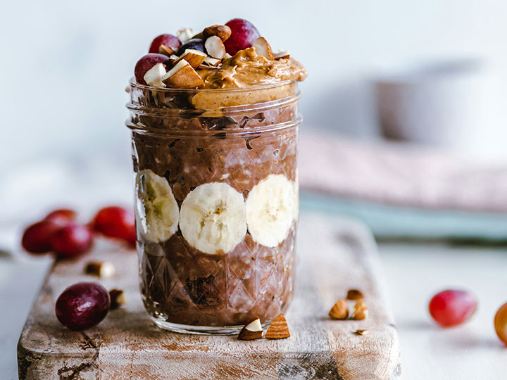 bananas, chocolate and peanut nutter in glass jar