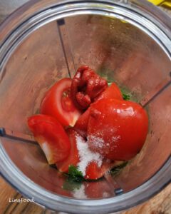 top shot of daqqus ingredients in a blender